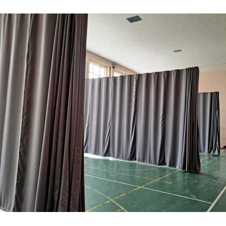 The dividing curtain construction, demountable, manual slided with steel rope